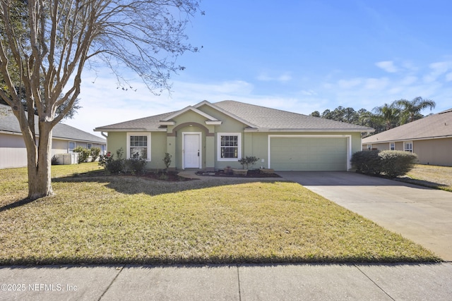 single story home with a garage and a front yard