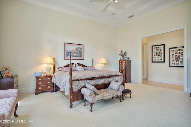 bedroom featuring crown molding, light carpet, and ceiling fan