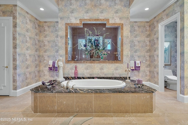 bathroom featuring a relaxing tiled tub, ornamental molding, toilet, and tile patterned flooring