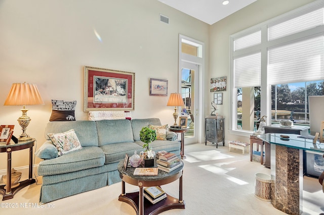 living room with light colored carpet