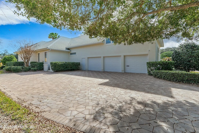 exterior space featuring a garage