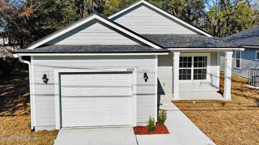 single story home with a garage