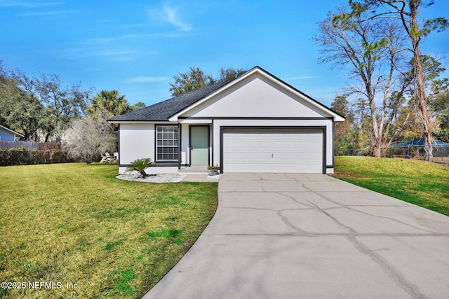 ranch-style home featuring a garage and a front lawn