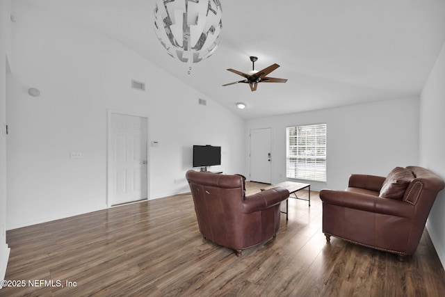 living room with ceiling fan, high vaulted ceiling, and dark hardwood / wood-style flooring