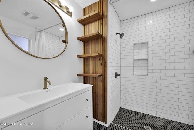 bathroom featuring vanity and a shower with curtain