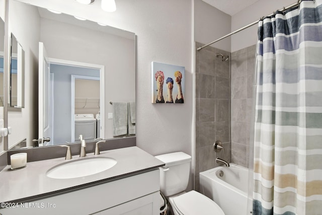 bathroom featuring a textured wall, shower / bathtub combination with curtain, toilet, vanity, and washer and dryer