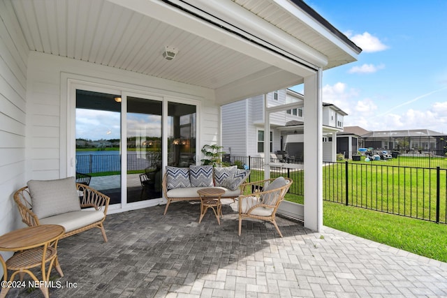 view of patio / terrace featuring fence