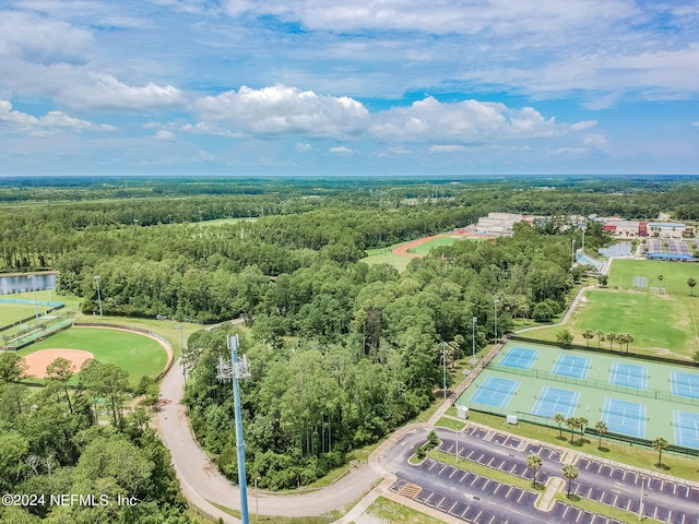 aerial view featuring a view of trees