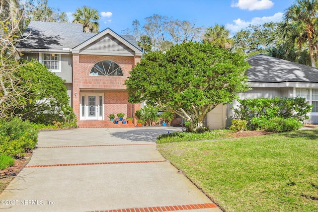 view of front of house with a front lawn