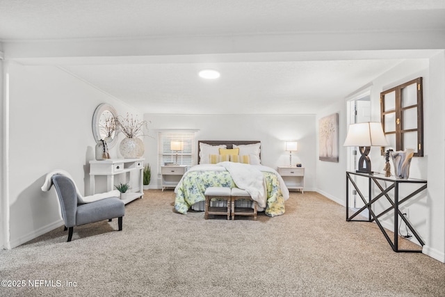 bedroom featuring carpet floors and baseboards