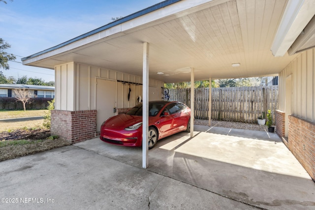 view of vehicle parking with a carport