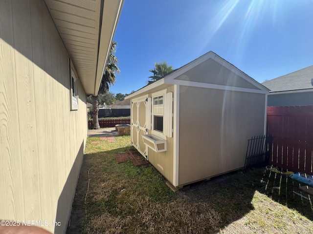 view of property exterior featuring a shed