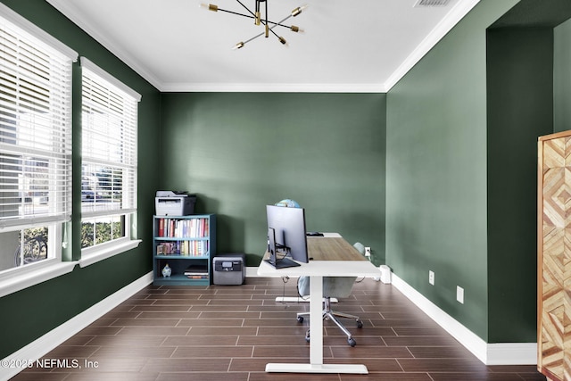 home office with a notable chandelier and crown molding