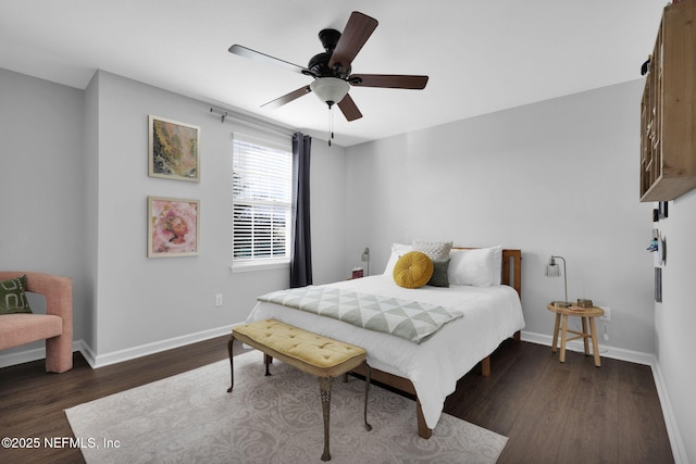 bedroom featuring dark hardwood / wood-style floors and ceiling fan