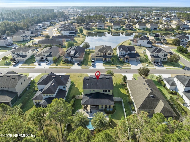 drone / aerial view featuring a water view