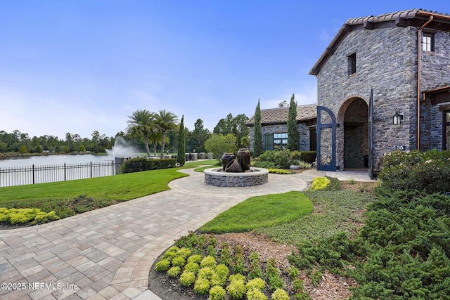 view of yard with a water view