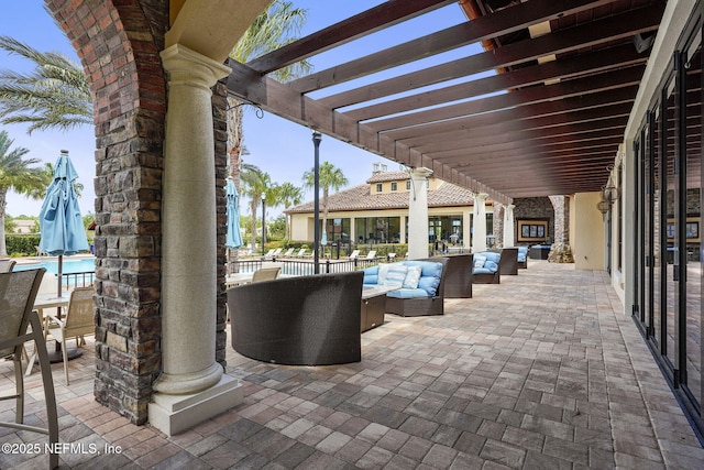 view of patio / terrace with outdoor lounge area and a pergola