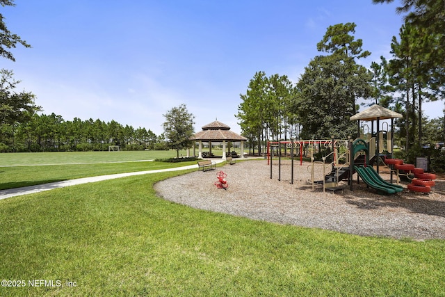 view of jungle gym featuring a gazebo and a lawn