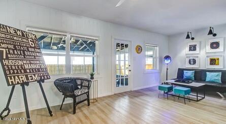 sitting room featuring hardwood / wood-style flooring