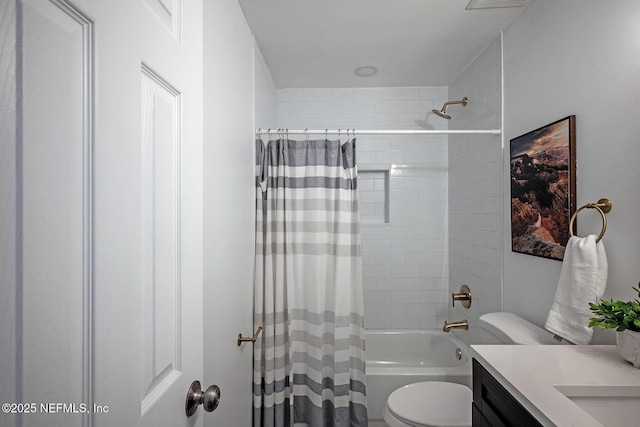 full bathroom featuring vanity, shower / bath combination with curtain, and toilet