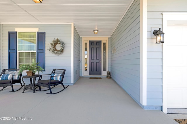 entrance to property with covered porch