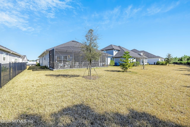 view of yard with a lanai