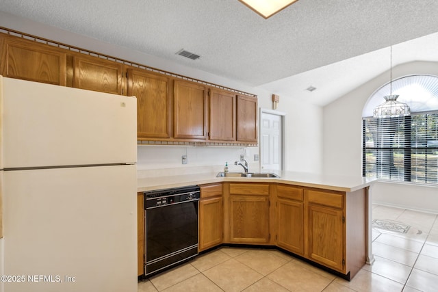 kitchen featuring sink, black dishwasher, decorative light fixtures, kitchen peninsula, and white fridge