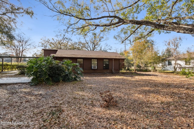 view of front of property with a carport