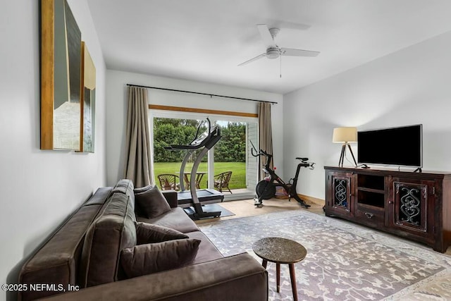 living area featuring ceiling fan