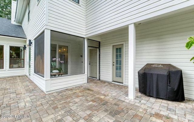 view of patio with a grill