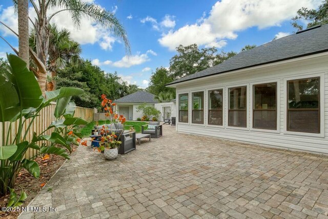 view of patio / terrace featuring outdoor lounge area and a fenced backyard