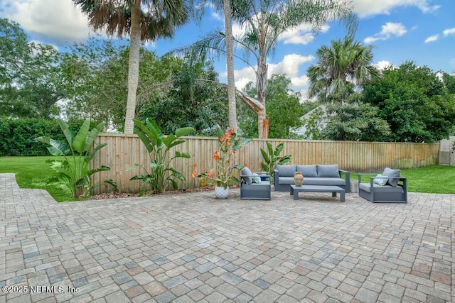 view of patio with a fenced backyard and an outdoor living space