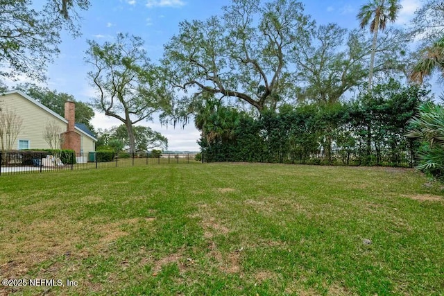 view of yard featuring fence