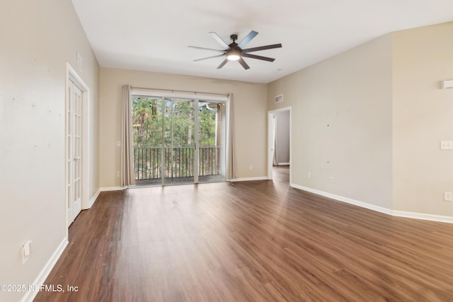 unfurnished room featuring dark hardwood / wood-style floors and ceiling fan