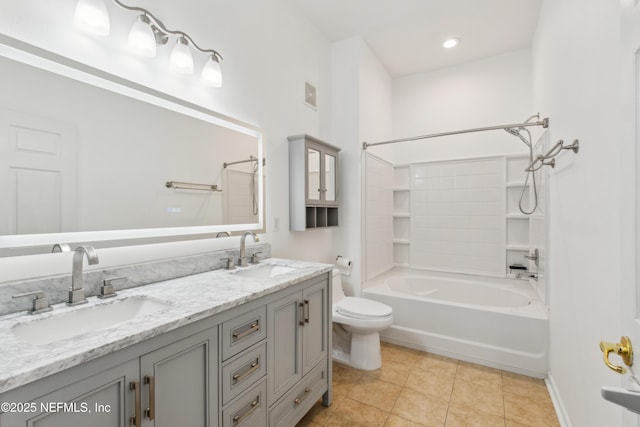 full bathroom featuring vanity, toilet, tile patterned floors, and shower / bathing tub combination