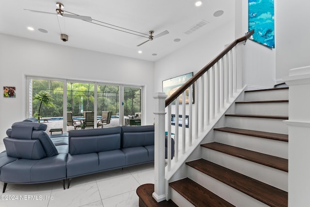 living room with ceiling fan