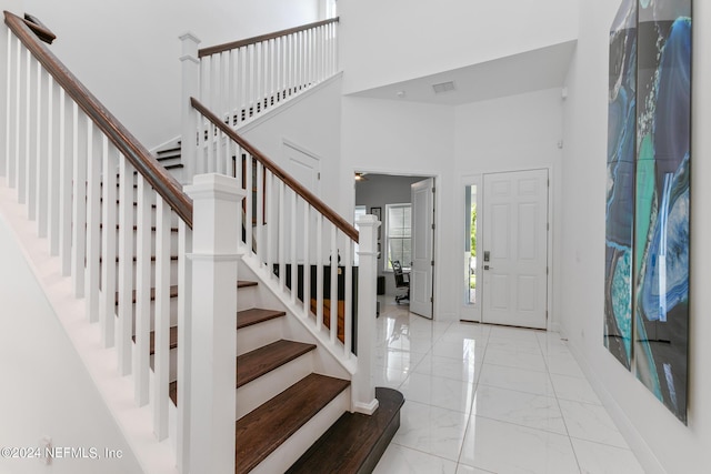 entrance foyer featuring a high ceiling