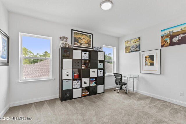 home office featuring light carpet