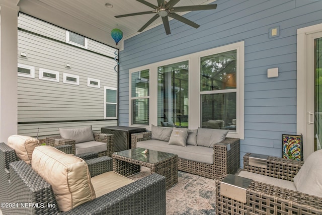 view of patio featuring ceiling fan and an outdoor living space