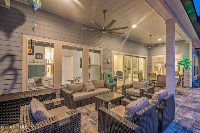 view of patio featuring outdoor lounge area and ceiling fan