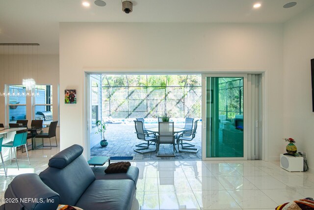 living room with an inviting chandelier