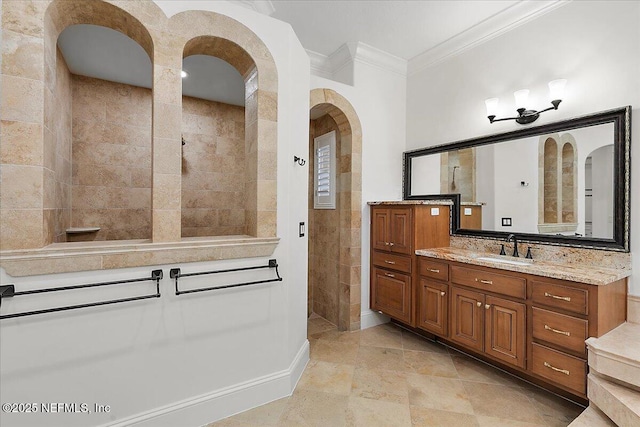 bathroom with crown molding, tile walls, and vanity