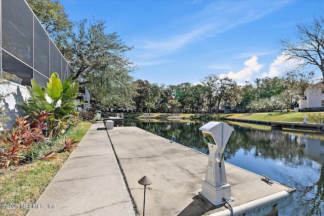 view of dock featuring a water view and a lanai