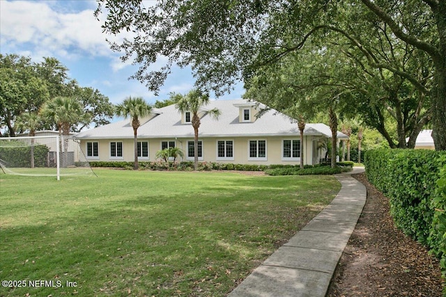 exterior space with a front lawn