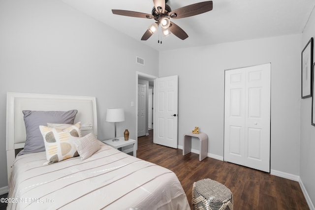 bedroom featuring vaulted ceiling, dark hardwood / wood-style floors, and ceiling fan