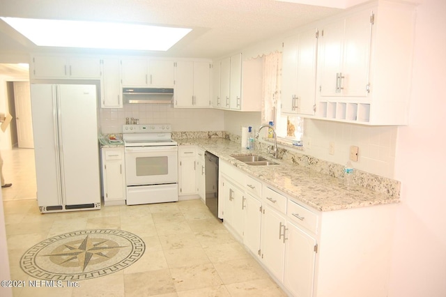 kitchen featuring white cabinetry, sink, white appliances, and decorative backsplash