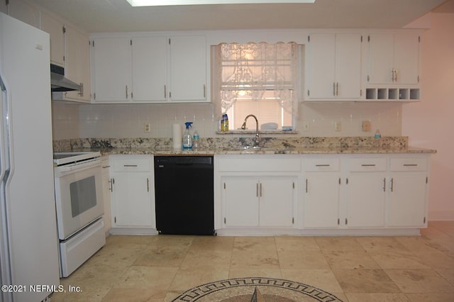 kitchen featuring sink, light stone counters, white cabinets, and white appliances