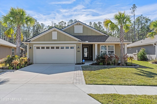 view of front facade featuring a garage and a front yard