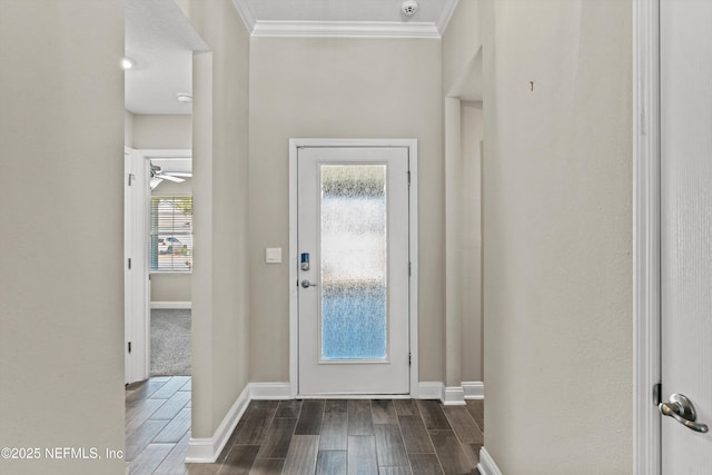 foyer entrance featuring crown molding