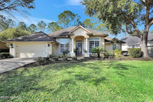 view of front of property featuring stucco siding, a front lawn, concrete driveway, and a garage